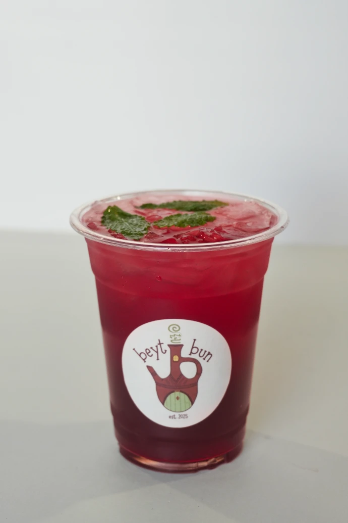 chicago mocktail cart pomegranate drink served in clear cup